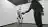Human and humanoid robot completing a handshake
